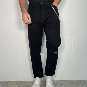 JEANS COOPER IN TELA FERMA CON TAGLI AL GINOCCHIO E ACCESSORIO CATENA REMOVIBILE - CARROT FIT